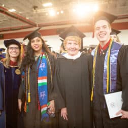 Faculty award winner Leslie Dunn, Ph.D., Associate Professor of Economics, student presenter Maya Nilkant 19, staff award winner Roberta Cross, Director of Career Services, and student presenter Michael Duncan 19, pose for a photo before the Commencement ceremony in the James David Ross Family Recreation Center May 18, 2019 on the campus of Washington & Jefferson College.