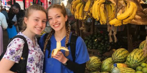 Caitlyn Brenner and Lena DiFulvio at a market in Kenya where they completed their Magellan projects.