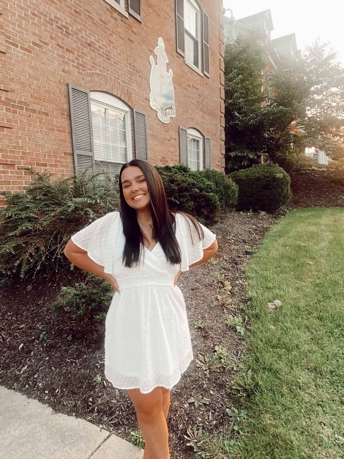 W&J senior Carlee Stelter poses in front of Delta Gamma house