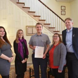 Brendan Troesch (center) poses with W&J professors and GABC representatives as they present him with his scholarship award.