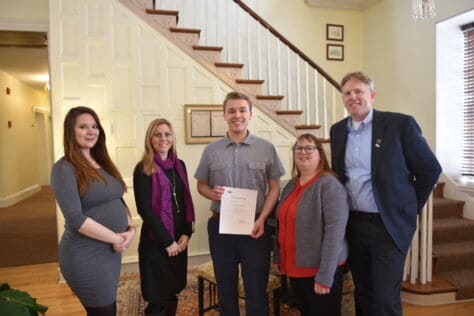 Brendan Troesch (center) poses with W&J professors and GABC representatives as they present him with his scholarship award.