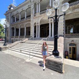 W&J rising sophomore Ella Phillips stands in front of the Lolani Palace in Honolulu, Oahu, Hawaii.