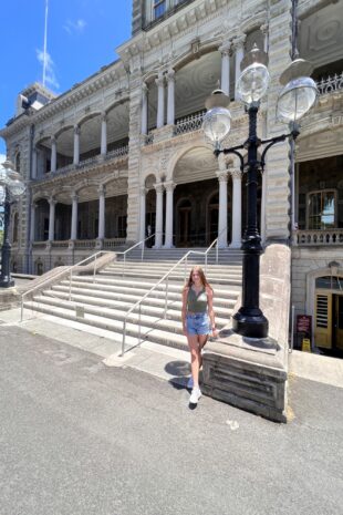 W&J rising sophomore Ella Phillips stands in front of the Lolani Palace in Honolulu, Oahu, Hawaii.