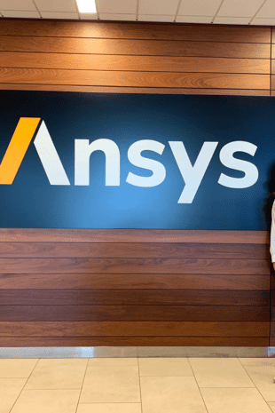 W&J rising senior Grace DePaul stands in front of Ansys company sign.