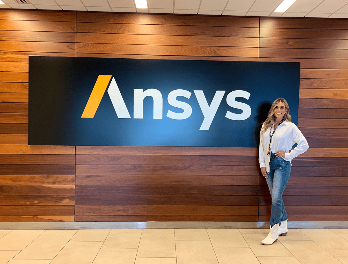 W&J rising senior Grace DePaul stands in front of Ansys company sign.