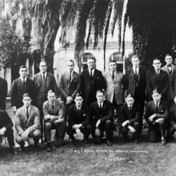 Members of W&J College's 1922 Rose Bowl team pose in front of palm trees