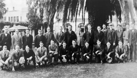 Members of W&J College's 1922 Rose Bowl team pose in front of palm trees