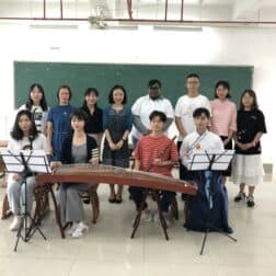 Photo of Han Ye, Ph.D., assistant professor of Chinese at W&J, in a classroom with her students.