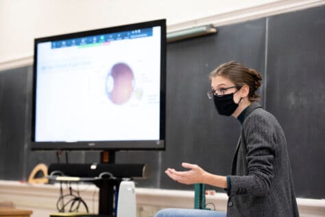 W&J Psychology Professor, Hannah Bradshaw, Ph.D., looks to her class while delivering a presentation.