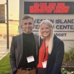 Brach Herzig and Julia Schaffer pose outside the NASA Workshop where they presented their research.