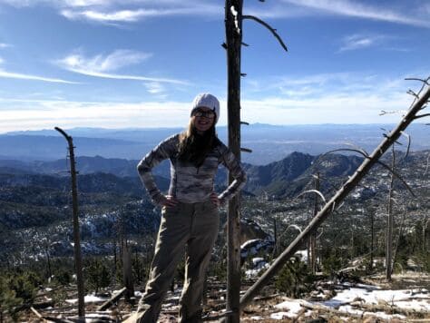 Kiley Miller poses on a mountain in Arizona during the JayTerm course trip for the class "Engaging the Sonoran Border."