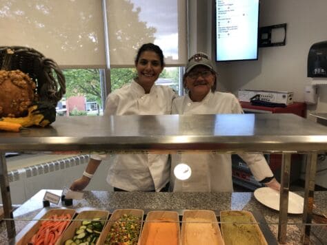 Chef Amira and a line cook in the W&J College cafeteria.