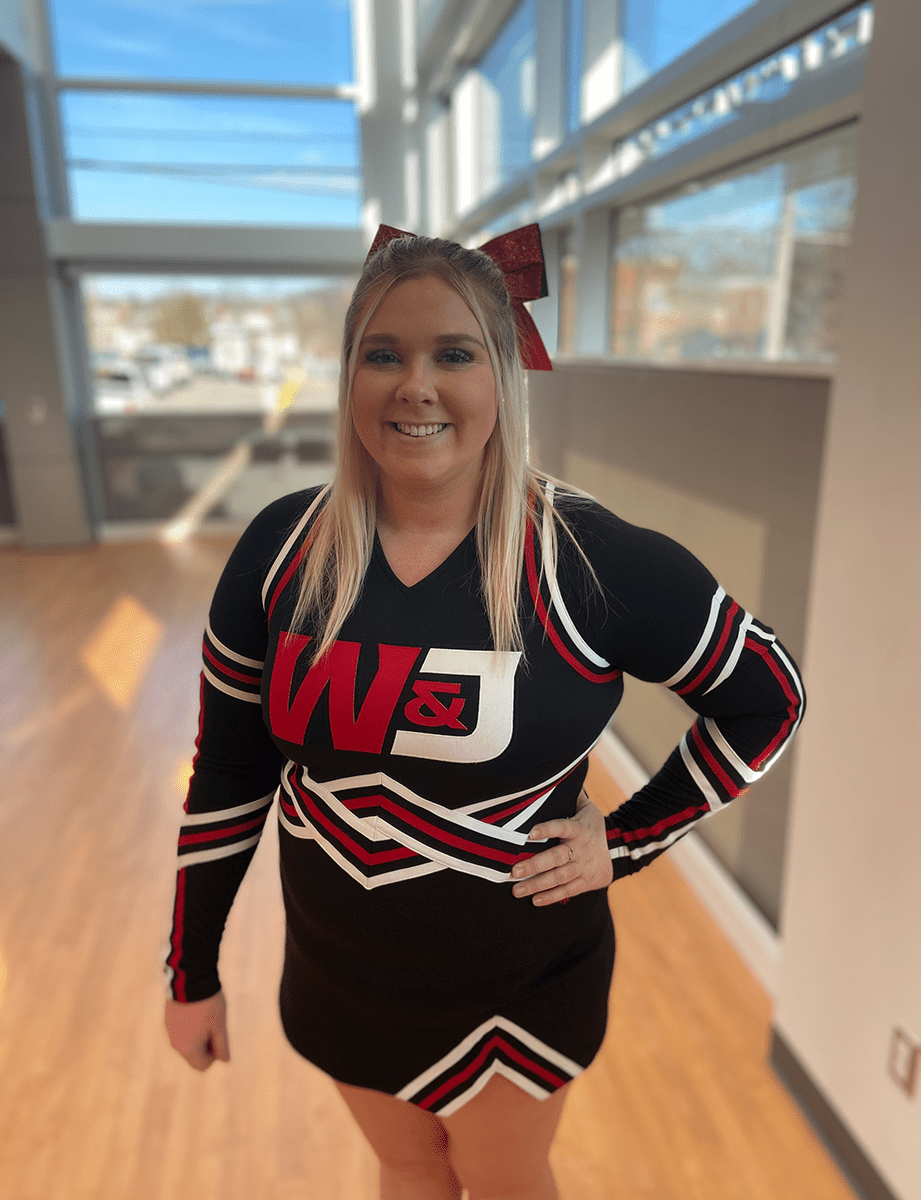 W&J senior Maci Ward poses in her W&J Cheer uniform.