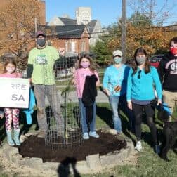 Group photo of W&J community members with a new tree