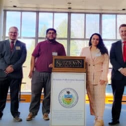 W&J students Jeffrey E. Seabury, Jr. ’22 , Lillien Shaer ’22, Mario Sanchez Isabas ’23, and Nickolas Bartel ’23 bookend a podium at the Pennsylvania Political Science Association (PPSA) 83rd Annual Meeting & Conference in Kutztown, Pennsylvania.