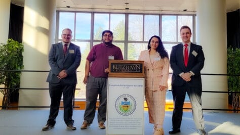 W&J students Jeffrey E. Seabury, Jr. ’22 , Lillien Shaer ’22, Mario Sanchez Isabas ’23, and Nickolas Bartel ’23 bookend a podium at the Pennsylvania Political Science Association (PPSA) 83rd Annual Meeting & Conference in Kutztown, Pennsylvania.