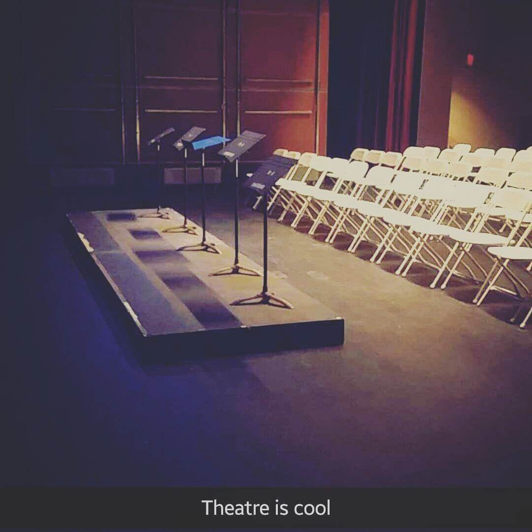 THEATRE SLAM - an image of the stage and lecterns