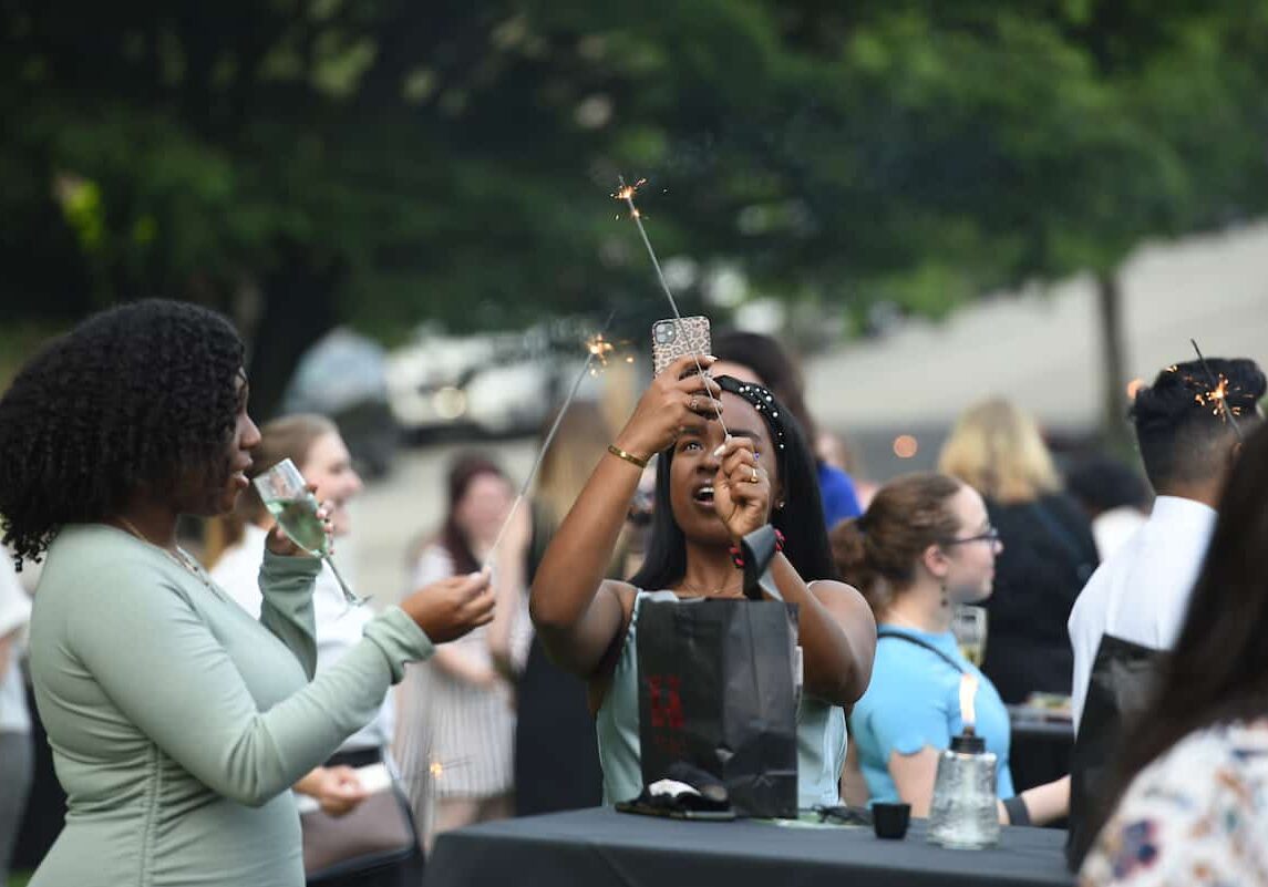 Seniors light sparklers on the Burnett Lawn for their senior wish May 22, 2021 on the campus of Washington &amp; Jefferson College in Washington, Pa.