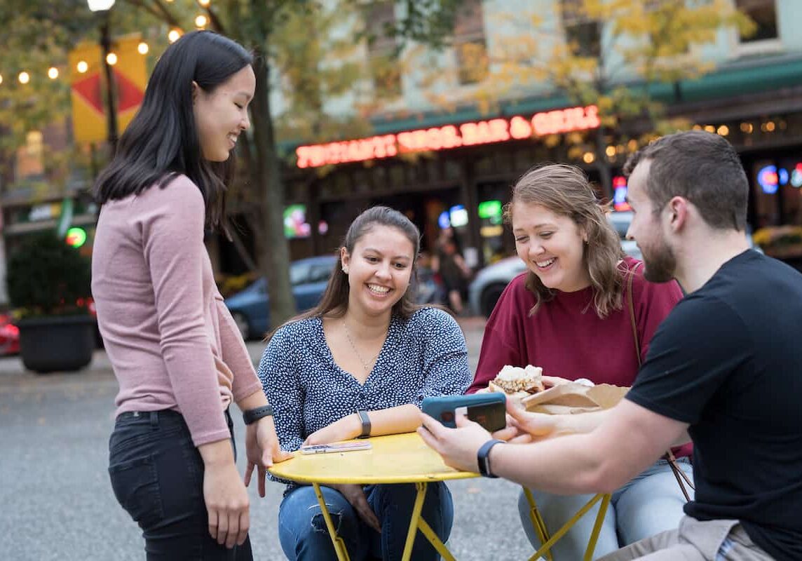 Students hang out in walks in Market Square outside of Primanti Brothers in the city of Pittsburgh October 21, 2019 during the Creosote Affects photo shoot at Washington & Jefferson College.