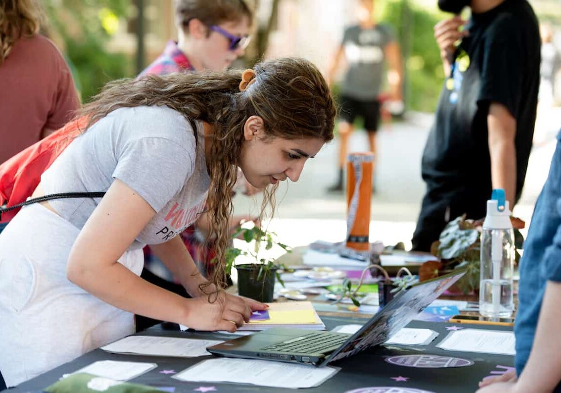 A student signs up for a club as student organizations and clubs hosted tables at the Involvement Expo August 29, 2019 at Washington & Jefferson College.