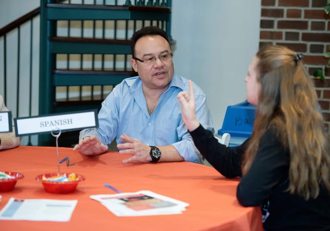 A student talks Associate Professor of Spanish H.J. Manzari, Ph.D., as students declare a major or add a minor or concentration during the Majors Fair in the Allen Ballroom of the Rossin Campus Center February 26, 2020 at Washington &amp; Jefferson College.