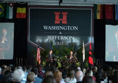 W&J President John C. Knapp, Ph.D., interviews the afternoon keynote speaker Nathan Law, a young activist for democracy in Hong Kong.