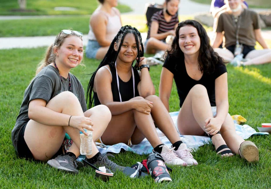 Students gather with friends at the Rockin the Lawn concert and picnic August 24, 2021 outside the Technology Center on the campus of Washington &amp; Jefferson College in Washington, Pa.