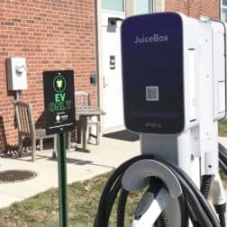 Car charging station being Clark Family Library