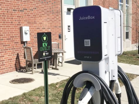 Car charging station being Clark Family Library