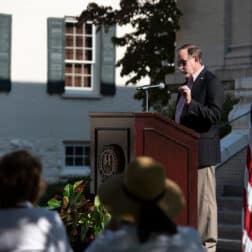 Dr. Knapp speaking at podium