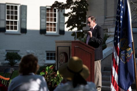 Dr. Knapp speaking at podium