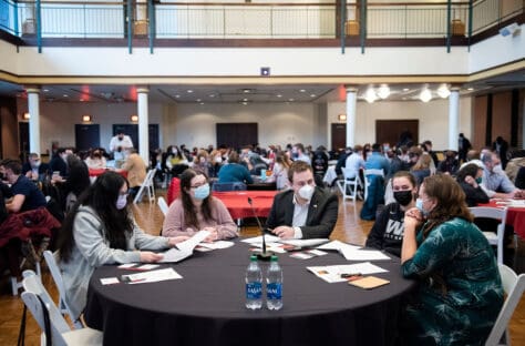 A group of W&J students discusses the Ukrainian-Russian War during the closing keynote session in the 2022 Symposium on Democracy.