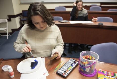 Coloring Club Meeting December 8 2019 Students in Coloring Club during a December meeting paint and color.