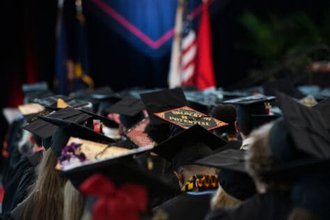Students display decorated mortarboards during the Commencement ceremony in the James David Ross Family Recreation Center May 18, 2019 on the campus of Washington &amp; Jefferson College.