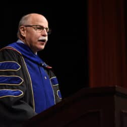 Vice President of Academic Affairs and Dean of the College Jeffrey A. Frick, Ph.D., reads the names of the Class of 2020 graduates. The 221st Commencement Ceremony was broadcast virtually August 1, 2020 from Olin Theatre on the campus of Washington & Jefferson College. A limited number of people were in attendance in addition the the platform party due to the COVID-19 pandemic and gathering limitations.