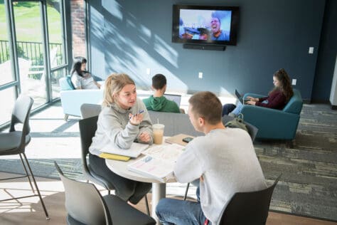 Students study and talk in the common area of a renovated Presidents Row residence hall as seen October 21, 2019 during the Creosote Affects photo shoot at Washington & Jefferson College.