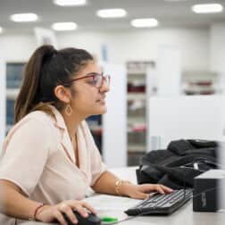 A student uses a computer in the Clark Family Library as seen October 21, 2019 during the Creosote Affects photo shoot at Washington & Jefferson College.