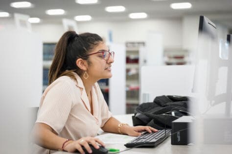 A student uses a computer in the Clark Family Library as seen October 21, 2019 during the Creosote Affects photo shoot at Washington & Jefferson College.