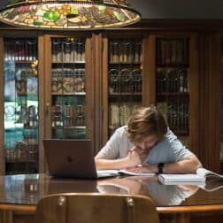 A student studies in the Walker Room of the Clark Family Library as seen October 21, 2019 during the Creosote Affects photo shoot at Washington & Jefferson College.