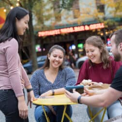 Students hang out in walks in Market Square outside of Primanti Brothers in the city of Pittsburgh October 21, 2019 during the Creosote Affects photo shoot at Washington & Jefferson College.
