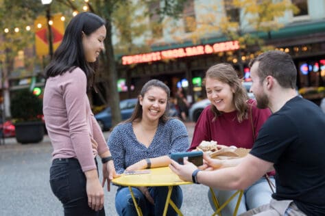 Creosote Photo Shoot October 2019 Students hang out in walks in Market Square outside of Primanti Brothers in the city of Pittsburgh October 21, 2019 during the Creosote Affects photo shoot at Washington & Jefferson College.