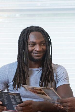 W&J Junior Raheem Clemons sits with an admission counselor.