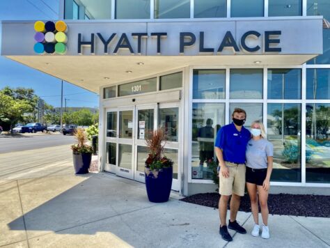 Colleen Kelley and Josh Burns pose outside of Hyatt Place in Dewey Beach, where they interned during the summer of 2020.
