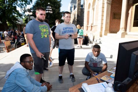 Students play video games during Washington & Jefferson College's Involvement Expo.