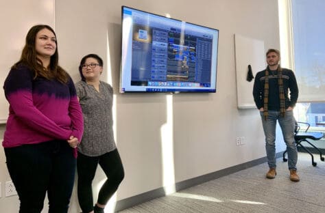 Students present their compositions from the Transforming Environmental Data into Music class during the 2019 PrezTech Challenge.