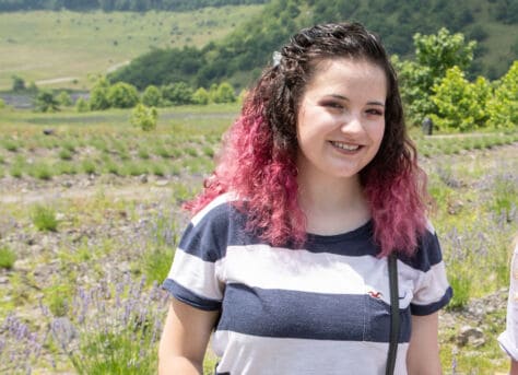 Rhiannon Wineland standing in a lavender field