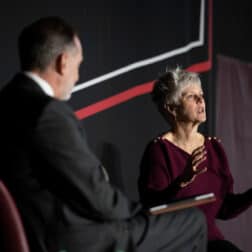 U.S. Government Official Kerry McBride '89 speaks to W&J President John Knapp at the 2022 Symposium on Democracy.