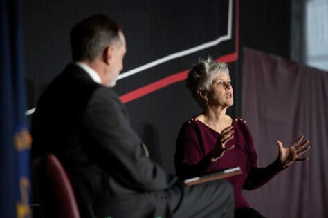 U.S. Government Official Kerry McBride '89 speaks to W&J President John Knapp at the 2022 Symposium on Democracy.